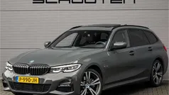 Grijs (metallic) Occasion 2022 BMW 320e M Sport Stationwagen | € 28.900 (Eerlijke prijs)