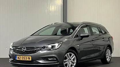 Occasion Opel Astra 110 PK (80 kW) 2017 Grijs (metallic) Stationwagen