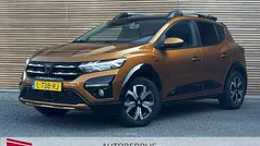 Oranje, metallic lak Gebruikt 2021 Dacia Sandero Comfort Hatchback | € 15.900 (Eerlijke prijs)