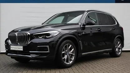 Zwart Gebruikt 2022 BMW X5 Executive SUV | € 62.400 (Goede deal)