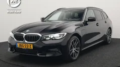Zwart Gebruikt 2021 BMW 330e Sport Line Stationwagen | € 30.740 (Goede deal)