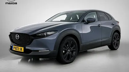 Polymetal grey (grijs metallic) Gebruikt 2022 Mazda CX-30 Luxury SUV | € 26.945 (Eerlijke prijs)