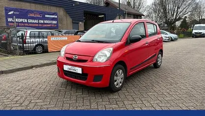 Occasion Daihatsu Cuore 69 PK (50 kW) 2008 Rood Hatchback