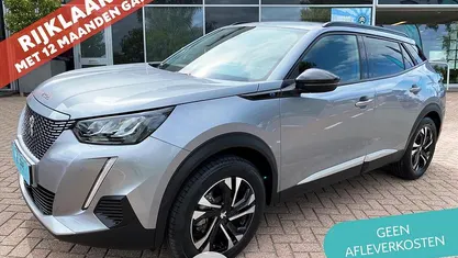 Occasion Peugeot e-2008 Allure 100 kW (136 PK) 2022 Grijs, metallic lak SUV