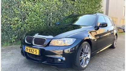 Occasion BMW 320 Luxury Line 184 PK (135 kW) 2012 Zwart Stationwagen