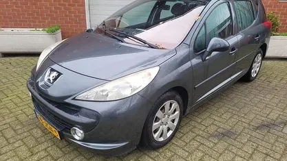 Occasion Peugeot 207 95 PK (69 kW) 2009 Grijs Stationwagen