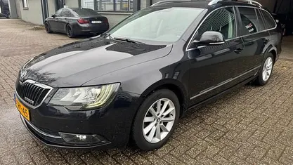 Occasion Skoda Superb Ambition 105 PK (77 kW) 2014 Zwart Stationwagen