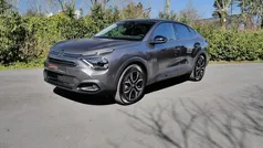 Grijs Gebruikt 2023 Citroën e-C4 Shine Sedan | € 23.950 (Eerlijke prijs)