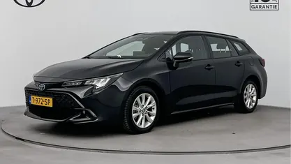 Gebruikt 2023 Toyota Corolla Hybrid Active Stationwagen | € 27.084 (Eerlijke prijs)