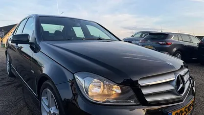 Zwart Gebruikt 2012 Mercedes C180 Avantgarde Sedan | € 9.950 (Eerlijke prijs)