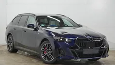 Blauw Gebruikt 2025 BMW 550e M Sport Stationwagen | € 87.895 (Super prijs)