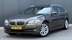 Bruin, metallic lak Gebruikt 2012 BMW 520 Executive Stationwagen | € 6.995 (Goede deal)