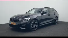Zwart Gebruikt 2021 BMW 320e Executive Stationwagen | € 33.950 (Eerlijke prijs)