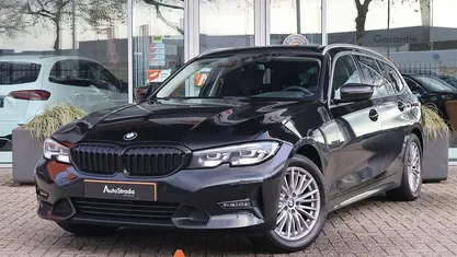 Zwart Gebruikt 2020 BMW 318 Executive Stationwagen | € 21.800 (Goede deal)