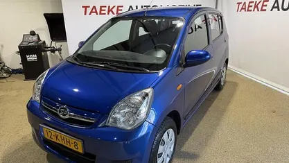 Occasion Daihatsu Cuore 69 PK (50 kW) 2009 Blauw Hatchback