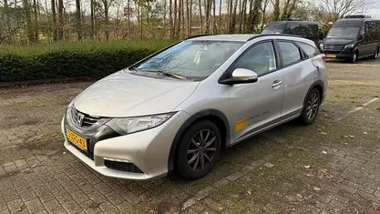 Grijs (metallic) Gebruikt 2015 Honda Civic Comfort Stationwagen | € 3.993 (Goede deal)