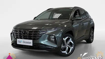 Amazon gray metallic/amazon grey pearl metallic (a5g) Gebruikt 2024 Hyundai Tucson Premium SUV | € 36.950 (Eerlijke prijs)