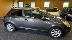 Grijs Gebruikt 2012 Opel Corsa Color Edition Hatchback | € 1.999 (Goede deal)