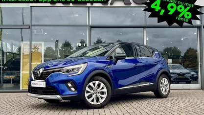 Occasion Renault Captur Intens 159 PK (116 kW) 2021 Twotone bleu iron / noir étoilé rqh+gne (blauw metallic) SUV