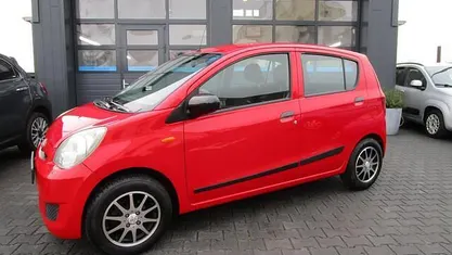 Occasion Daihatsu Cuore 69 PK (50 kW) 2009 Rood Hatchback
