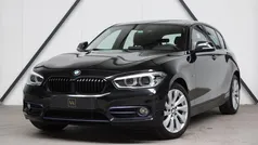 Zwart, metallic lak Gebruikt 2015 BMW 116 Sport Line Hatchback | € 11.999 (Eerlijke prijs)