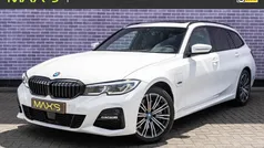 Wit Gebruikt 2022 BMW 330e Executive Stationwagen | € 37.894 (Eerlijke prijs)