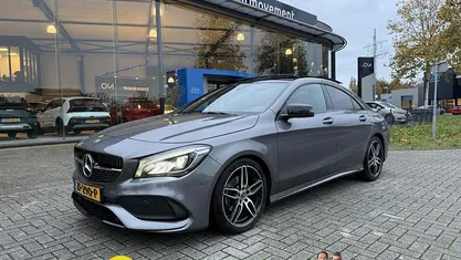 Grijs (metallic) Occasion 2019 Mercedes CLA180 AMG line Sedan | € 25.945 (Eerlijke prijs)