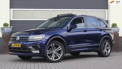 Blauw (metallic) Gebruikt 2017 VW Tiguan Highline SUV | € 23.900 (Eerlijke prijs)