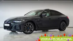 Grijs Gebruikt 2024 BMW i4 Executive Sedan | € 54.895 (Eerlijke prijs)