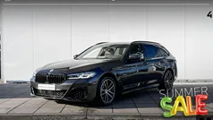 Grijs Gebruikt 2023 BMW 530e M Sport Stationwagen | € 48.900 (Eerlijke prijs)