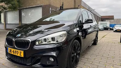 Zwart Gebruikt 2016 BMW 220 Executive Stationwagen | € 13.950 (Eerlijke prijs)