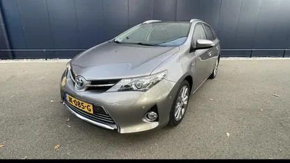 Occasion Toyota Auris Hybrid Executive 2015 Bruin Stationwagen