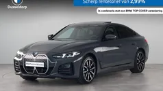 Grijs Gebruikt 2025 BMW i4 Comfort Edition Sedan | € 53.950 (Eerlijke prijs)