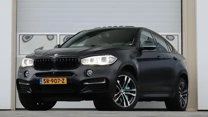 Zwart (metallic) Gebruikt 2015 BMW X6 M50 SUV | € 21.940 (Goede deal)