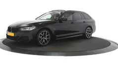 Grijs Gebruikt 2024 BMW 530e M Sport Stationwagen | € 51.995 (Eerlijke prijs)