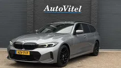 Grijs Gebruikt 2023 BMW 330e M Sport Stationwagen | € 41.845 (Eerlijke prijs)
