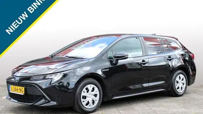Zwart Gebruikt 2021 Toyota Corolla Comfort Stationwagen | € 21.950 (Eerlijke prijs)