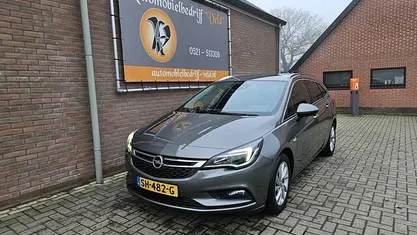Grijs (metallic) Occasion 2018 Opel Astra Business Stationwagen | € 4.995 (Super prijs)
