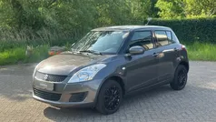 Grijs, metallic lak Gebruikt 2012 Suzuki Swift Hatchback | € 7.499 (Eerlijke prijs)