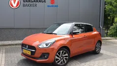 Oranje Gebruikt 2022 Suzuki Swift Style Hatchback | € 17.900 (Eerlijke prijs)