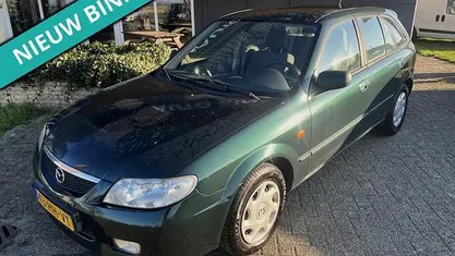 Groen (metallic) Gebruikt 2001 Mazda 323 Exclusive Hatchback | € 2.450 (Eerlijke prijs)