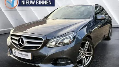 Grijs Occasion 2015 Mercedes E220 AMG Sedan | € 10.990 (Goede deal)