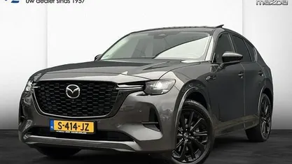 Machine grey (grijs metallic) Gebruikt 2023 Mazda CX-60 Homura-Line SUV | € 43.750 (Goede deal)