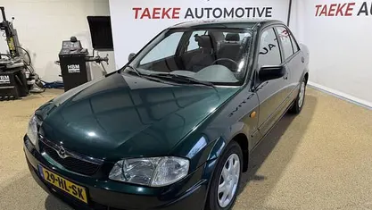 Occasion Mazda 323 88 PK (64 kW) 2001 Groen Sedan