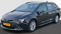 Zwart Gebruikt 2023 Toyota Corolla Hybrid Active Stationwagen | € 25.845 (Eerlijke prijs)