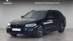 Zwart Gebruikt 2023 BMW 520 M Sport Stationwagen | € 50.450 (Eerlijke prijs)
