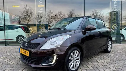 Bruin Gebruikt 2015 Suzuki Swift Style Hatchback | € 8.445 (Eerlijke prijs)