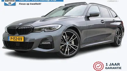 Grijs Gebruikt 2022 BMW 330 M Sport Stationwagen | € 33.950 (Eerlijke prijs)