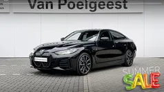 Zwart Gebruikt 2024 BMW i4 Executive Sedan | € 47.900 (Super prijs)