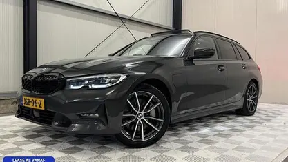 Grijs Occasion 2020 BMW 330 Executive Stationwagen | € 28.980 (Goede deal)